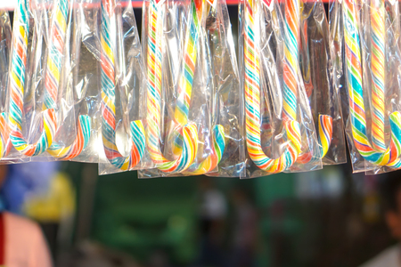 Candy hangs on the floor waiting to sell.の写真素材