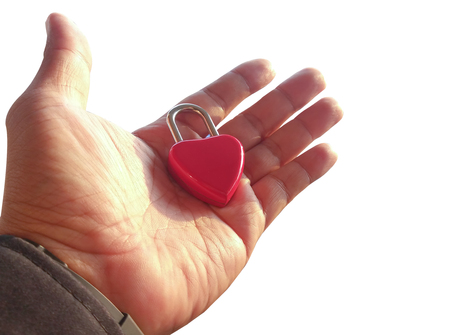 Red heart in the hands of men, Valentine's Day concept and add to the power of the mind.の写真素材