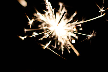 Children are playing fireworks as a beautiful light.