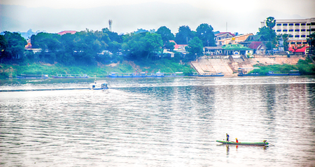 Fishing boat,The way of life of people living along the Mekong River, Thailand.の写真素材