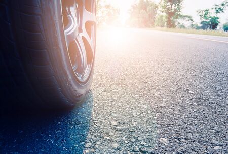 Wheels on the road with morning light, concepts of business success