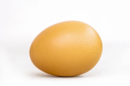 Chicken eggs on a white background.の写真素材