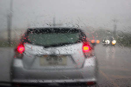 background blur, raindrop on car windshield