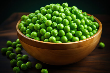Green peas in wooden bowl.の素材
