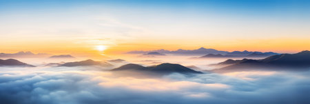 Aerial view of Beautiful sunrise sky above clouds or fog with dramatic light at dawn.の素材