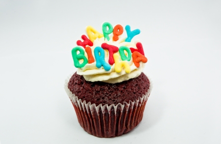 Cupcake decorated with birthday candlesの写真素材