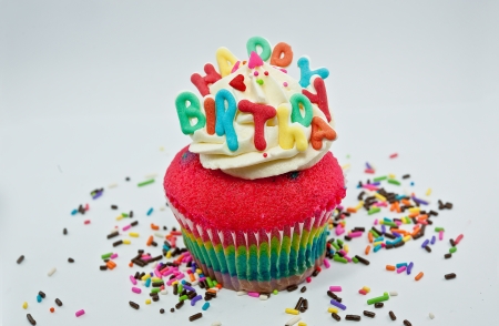 Cupcake decorated with birthday candlesの写真素材