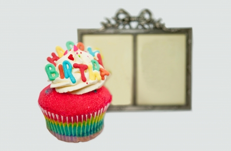 Cupcake decorated with birthday candlesの写真素材