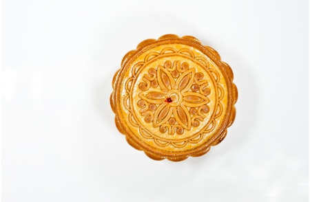 Close up of a mooncake isolated over white backgroundの写真素材