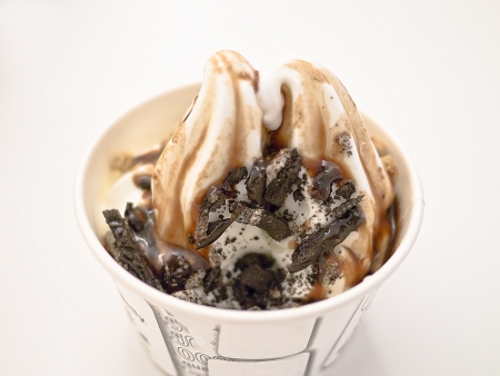 Scoop of stracciatella ice cream on white background の写真素材
