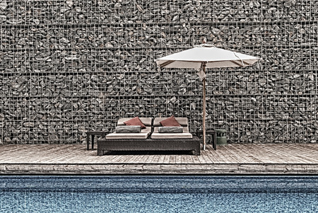 Umbrella pool and chairの写真素材