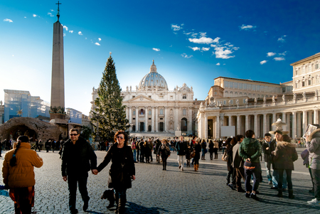 VATICAN CITY, VATICAN  : Tourists at Saint Peter's Square on December 25, 2012 in Vatican City, Vatican. Saint Peter's Square is among most popular pilgrimage sites for Roman Catholics.のeditorial素材
