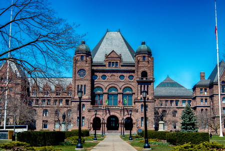 TORONTO - APRIL 18: Ontario Legislative Building on April 18, 2015 in Toronto. It was designed by architect Richard A. Waite; its construction begun in 1886 and it was opened in 1893.のeditorial素材