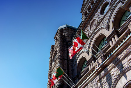 TORONTO - APRIL 18: Ontario Legislative Building on April 18, 2015 in Toronto. It was designed by architect Richard A. Waite; its construction begun in 1886 and it was opened in 1893.のeditorial素材