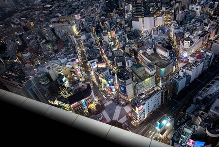 TOKYO, JAPAN - January 11, 2020 : Traffic passes through Shibuya Crossing. The intersection is considered one of the world's busiest scramble crosswalksのeditorial素材