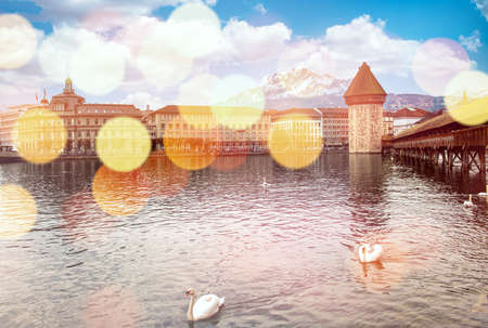LUZERN, SWITZERLAND - APRIL 11:Chapel bridge famous place on lake Luzern with snow mountain behide, APRIL 11,2015, Lucerne, Switzerland. Chapel bridge famous place on lake Lucerne Switzerland, Europe.のeditorial素材