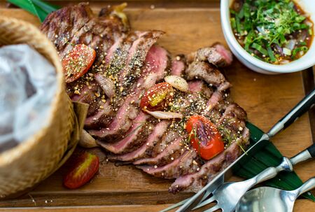 Thai style grilled beef with Thai spicy sauce.の写真素材