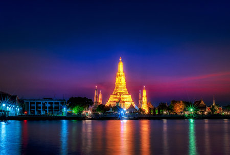 Wat Arun Temple Night illuminated in Bangkok, Thailand.の写真素材