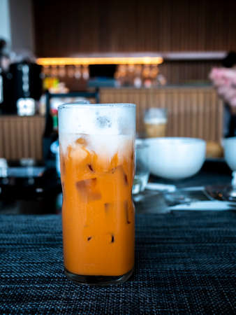thai iced tea with milk in the cafeの写真素材
