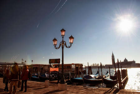 VENICE, ITALY - December 25, 2012: Piazza San Marco with the Basilica of Saint Mark and the bell tower of St Mark's Campanile (Campanile di San Marco) in Venice, Italy December 25, 2012のeditorial素材