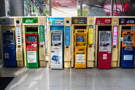 Bangkok, Thailand - MAR 5, 2022 : Colorful automatic teller machine (ATM) in a shopping mall.のeditorial素材