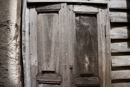 Ancient Thai style wooden sculpture doorの写真素材
