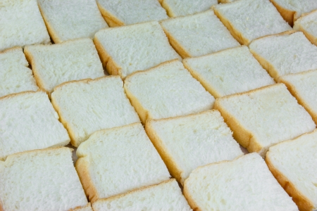 closeup of some pieces of sliced breadの写真素材