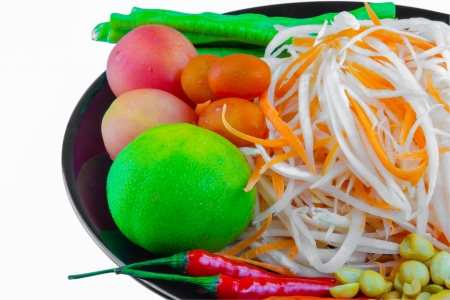 Papaya salad ingredients on Black plateの写真素材