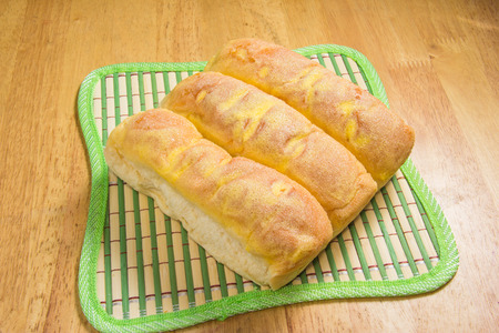 sugar butter bread on wood tabletopの写真素材