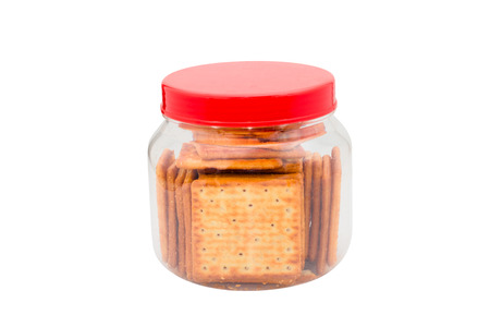 jar  with cracker biscuit isolated on whiteの写真素材