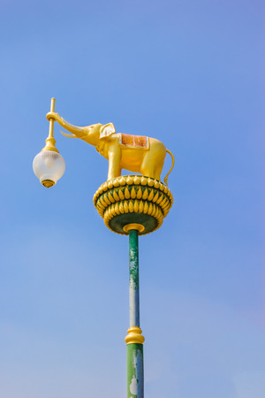 Golden elephants on street lamp, lamp hanger, Thailandの写真素材