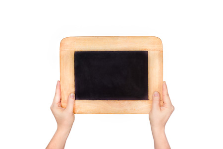 hands holding slate blackboard isolated on white backgroundの写真素材