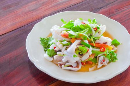 Thai style salad seafood on the wood tableの写真素材