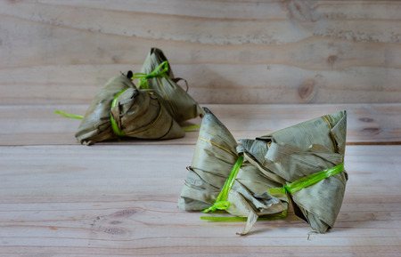 zongzi or Bak Chang on wood backgroundの写真素材