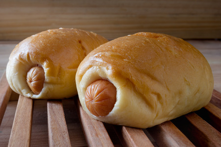 sausage buns with wood panel