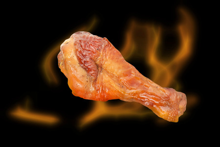 roasted thigh chicken on black backgroundの写真素材