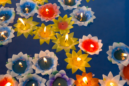 Lotus Candle in Thai Templeの写真素材