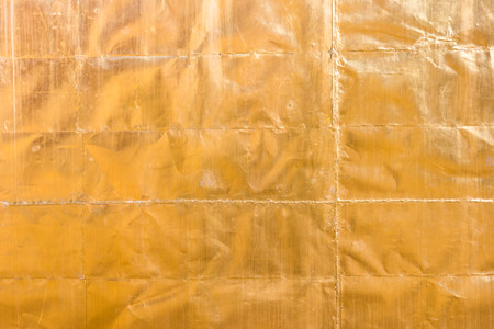 Metal surface is golden.の写真素材