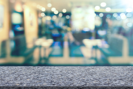 Marble table with restaurant blur backgroundの写真素材