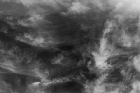 Textured cloud,Abstract black,isolated on black backgroundの写真素材