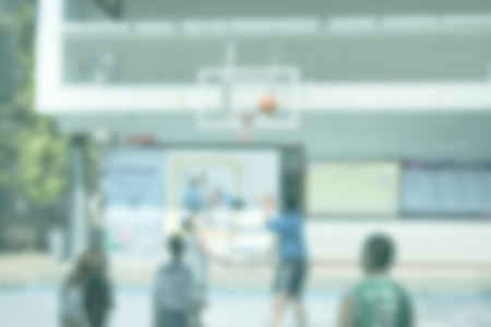 Children playing basketball blur background of Illustration,Abstract Blurred 