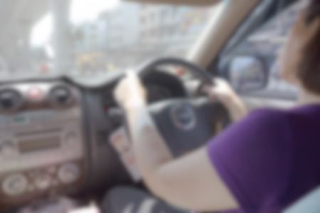Woman drive car blur background of Illustration,Abstract Blurredの写真素材