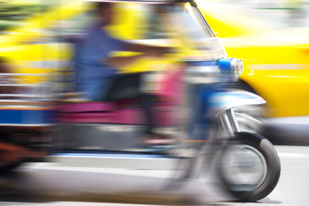 Tuk tuk taxi  Motion blurred backgroundの写真素材