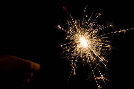 Fire sparklers on backgroundの写真素材
