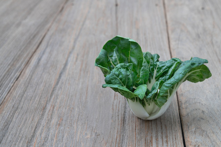 Pak choi on wooden tableの写真素材