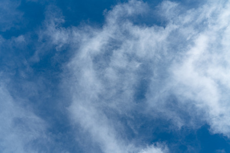 White cloud and blue sky backgroundの写真素材