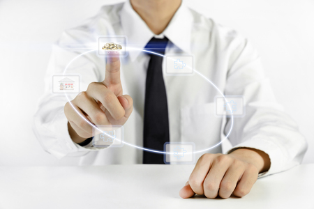 Businessman plan business growth with puzzle pieces iconsの写真素材