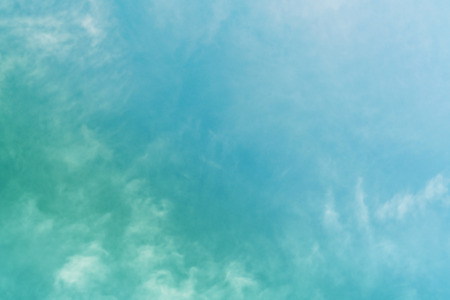 White cloud and blue sky background with copy spaceの写真素材