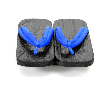 sandals wooden shoes of traditional japanese on white background