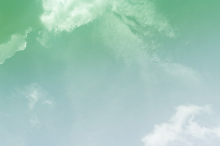 White cloud and blue sky background with copy space